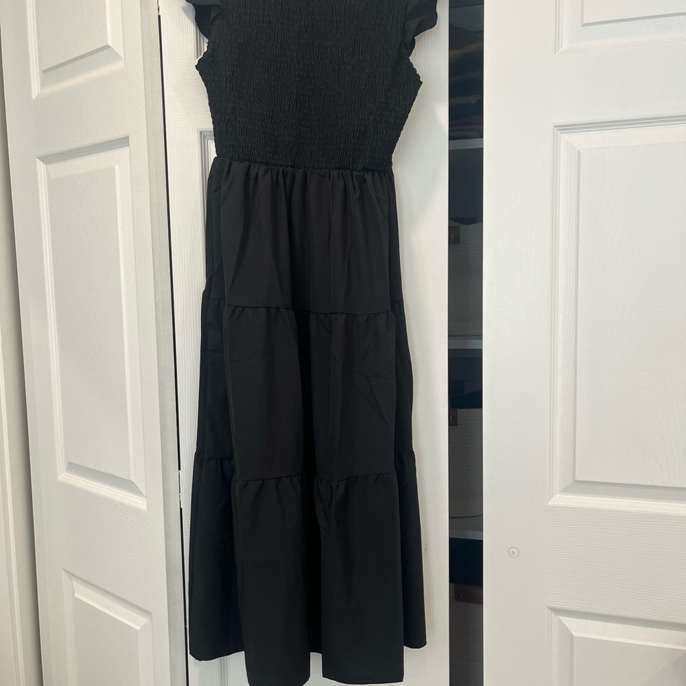 Black midi dress with smocked top
